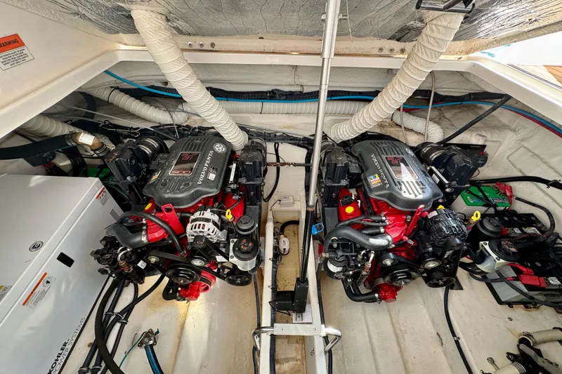 Escape Yacht Photos Pics Engine room of a 2009 Rinker 360 Express Cruiser with dual Volvo Penta engines.