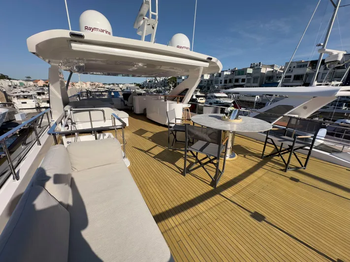 Yacht Photos Pics Luxurious 2020 Azimut GRANDE 25 METRI yacht deck with seating and dining area.
