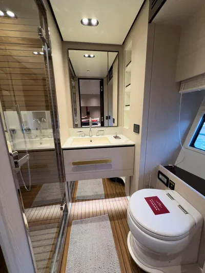  Yacht Photos Pics Luxurious bathroom in 2020 Azimut GRANDE 25 METRI yacht with modern fixtures and elegant design.
