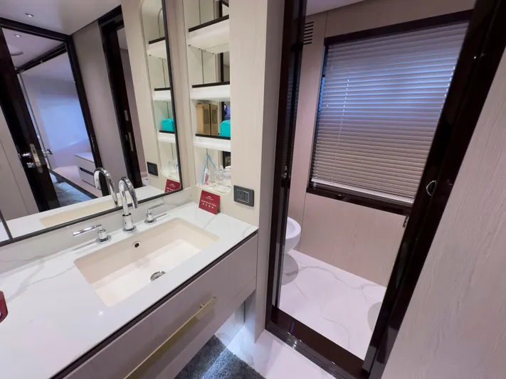  Yacht Photos Pics Luxurious bathroom interior on 2020 Azimut GRANDE 25 METRI yacht, featuring modern sink and elegant design.