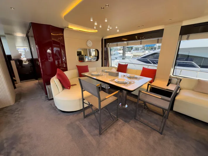  Yacht Photos Pics Luxurious dining area on 2020 Azimut GRANDE 25 METRI yacht with elegant seating and table settings.