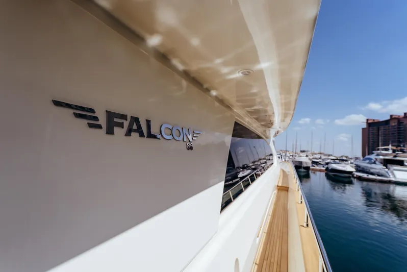 Apache Yacht Photos Pics Luxury Falcon 86 yacht docked at marina, showcasing sleek design and elegant craftsmanship.