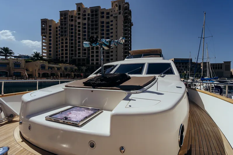 Apache Yacht Photos Pics Luxury Falcon 86 yacht docked at marina, cityscape in background, sunny day, 2004 model.