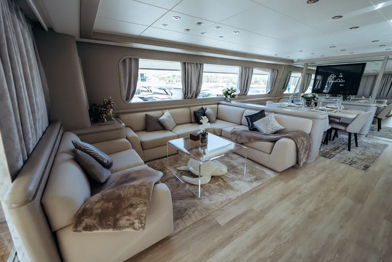 Apache Yacht Photos Pics Luxurious interior of 2004 Falcon 86 yacht with elegant seating and modern decor.