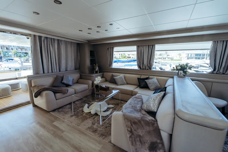 Apache Yacht Photos Pics Luxurious interior of 2004 Falcon 86 yacht with elegant seating and decor.
