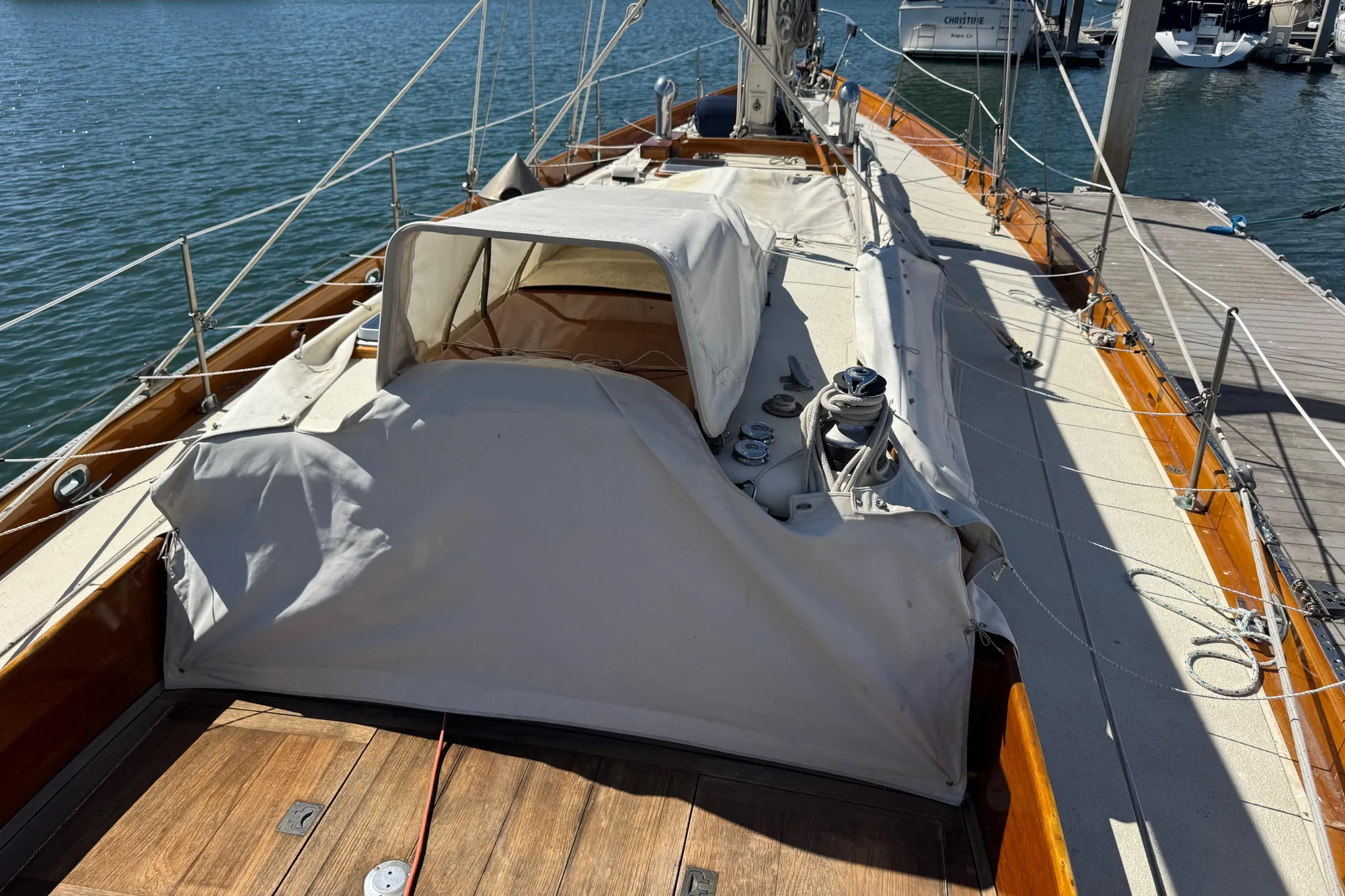 1956 Aage Nielsen 50' Yawl sailboat docked, showcasing deck and rigging details.