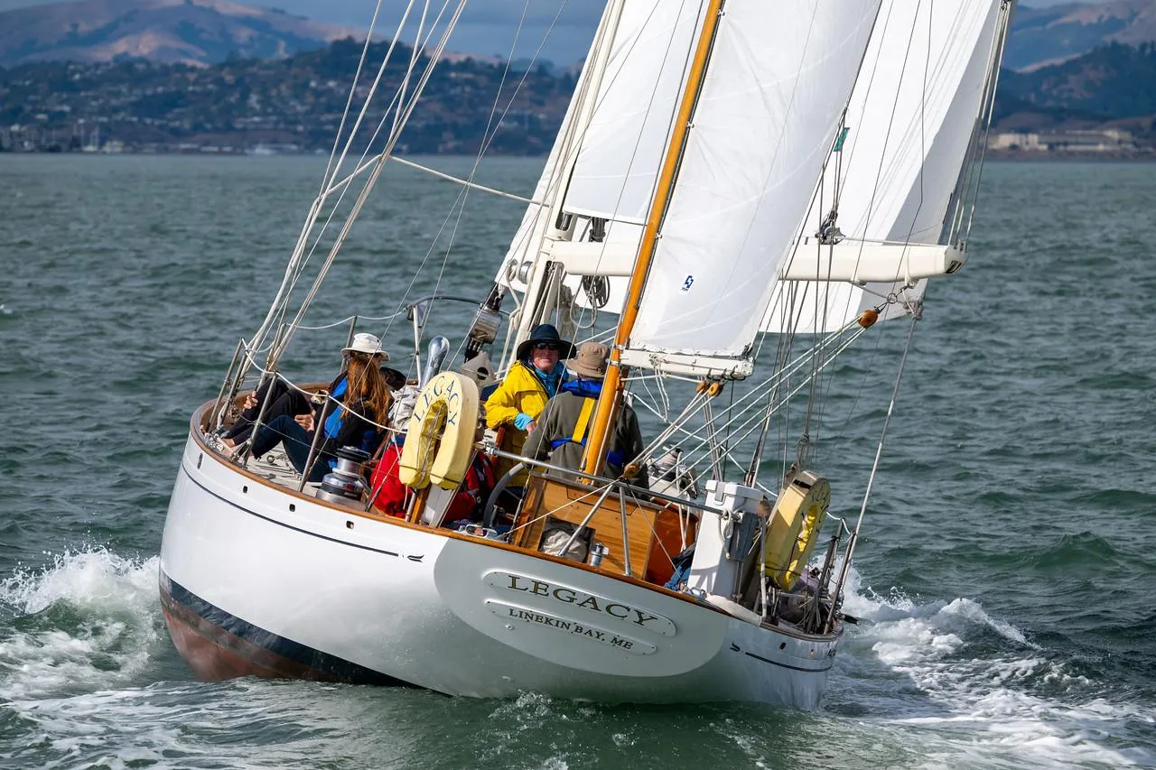 Aage Nielsen 1956 50' Ketch sailing on open water with crew onboard.