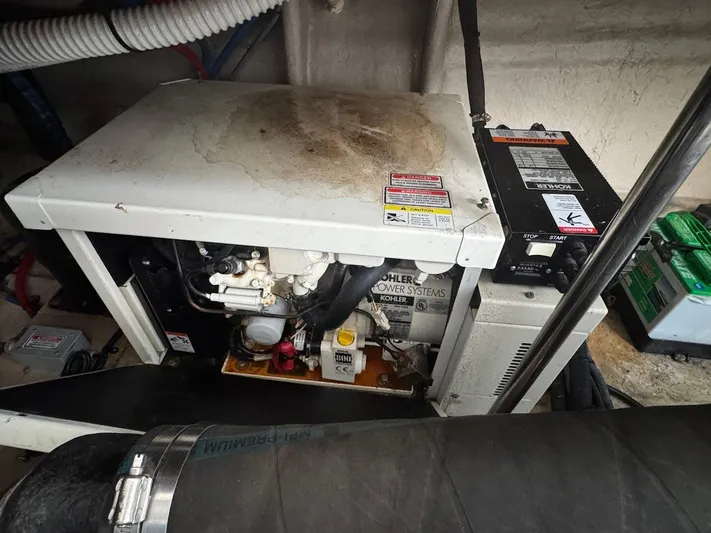 Rehab Is For Quitters Yacht Photos Pics Engine room of 2003 Sea Ray 420 Sundancer with Kohler power system.