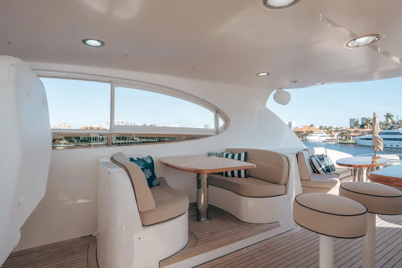 Lady Kristina Yacht Photos Pics Luxurious 2004 Lazzara LY106 yacht interior with elegant seating and scenic views.