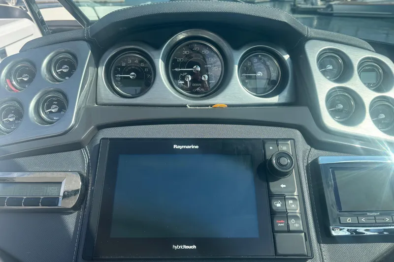  Yacht Photos Pics Dashboard of a 2018 Monterey 328SS Super Sport boat with Raymarine display.