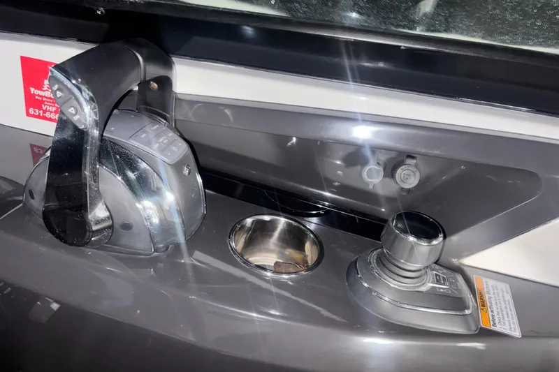  Yacht Photos Pics Control panel of a 2018 Monterey 328SS Super Sport boat with throttle and joystick.