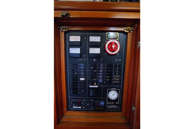 Amazing Grace Yacht Photos Pics Electrical panel of 1983 Kadey-Krogen Manatee 36 boat with gauges and switches.