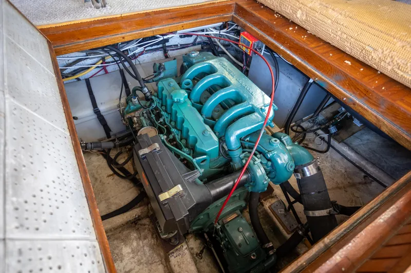 Amazing Grace Yacht Photos Pics Engine compartment of 1983 Kadey-Krogen Manatee 36, showcasing marine engine and wiring.