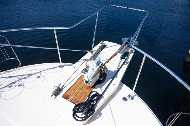 Amazing Grace Yacht Photos Pics Bow of 1983 Kadey-Krogen Manatee 36 yacht with anchor and railing.