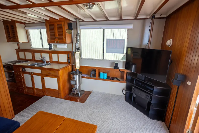 Amazing Grace Yacht Photos Pics Interior of 1983 Kadey-Krogen Manatee 36 with kitchen and entertainment area.