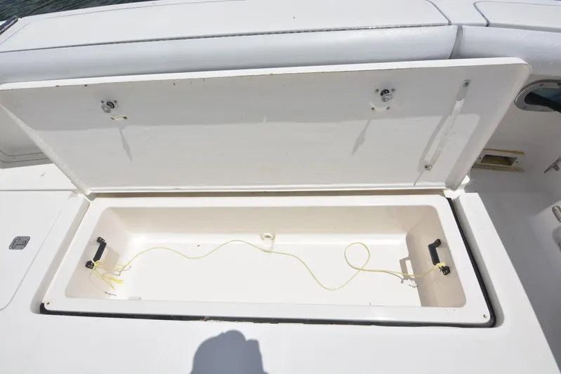 Uncouth Yacht Photos Pics Open storage compartment on a 2000 Tiara Yachts 4100 Open boat.