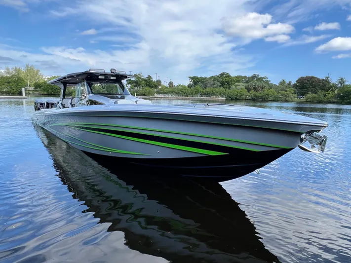  Yacht Photos Pics 2024 Nor-Tech 500 Sport boat with sleek design on calm water.