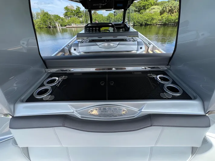  Yacht Photos Pics 2024 Nor-Tech 500 Sport boat interior with sleek design and cup holders.