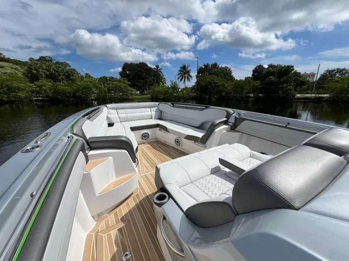  Yacht Photos Pics Luxurious 2024 Nor-Tech 500 Sport boat interior with plush seating and scenic water view.