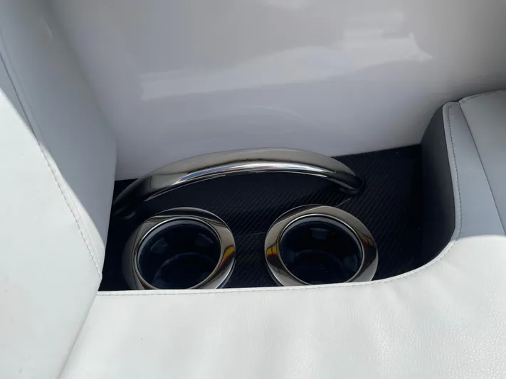  Yacht Photos Pics 2024 Nor-Tech 500 Sport interior with sleek cup holders and chrome handle.