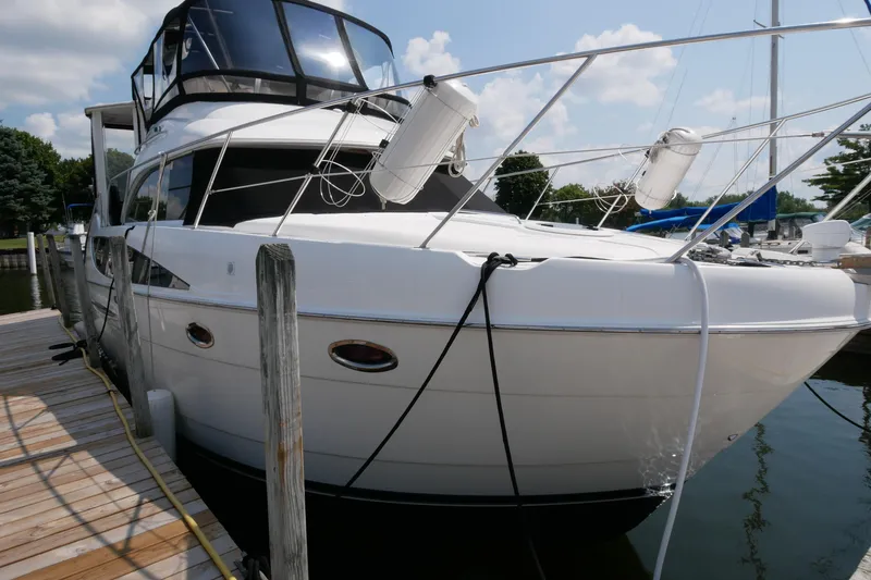 The Wanderer Yacht Photos Pics 2005 Meridian 368 Motoryacht docked at marina, featuring sleek design and modern amenities.