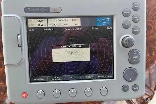 The Wanderer Yacht Photos Pics Navigation system display on 2005 Meridian 368 Motoryacht, showing radar and coordinates.