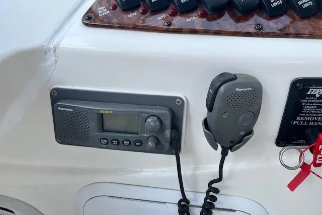 The Wanderer Yacht Photos Pics Control panel of 2005 Meridian 368 Motoryacht with Raymarine radio and microphone.