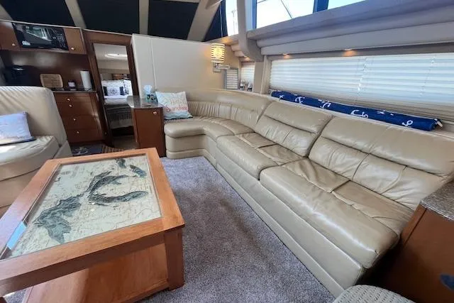 The Wanderer Yacht Photos Pics Luxurious interior of 2005 Meridian 368 Motoryacht with leather seating and nautical decor.