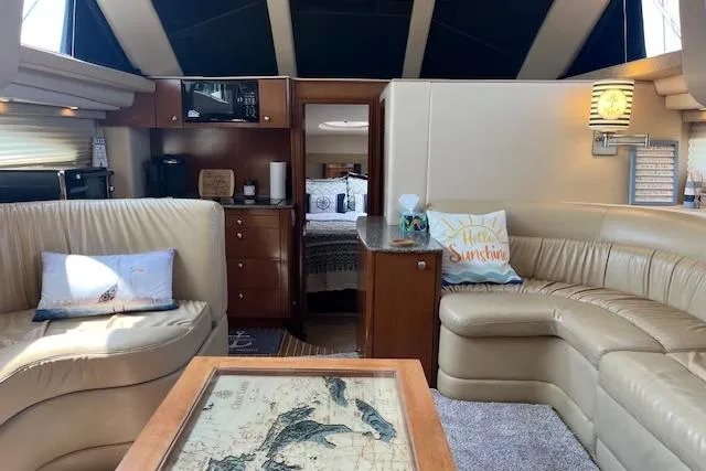 The Wanderer Yacht Photos Pics Luxurious interior of 2005 Meridian 368 Motoryacht with leather seating and nautical decor.