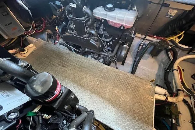 The Wanderer Yacht Photos Pics Engine room of a 2005 Meridian 368 Motoryacht, featuring mechanical components and wiring.