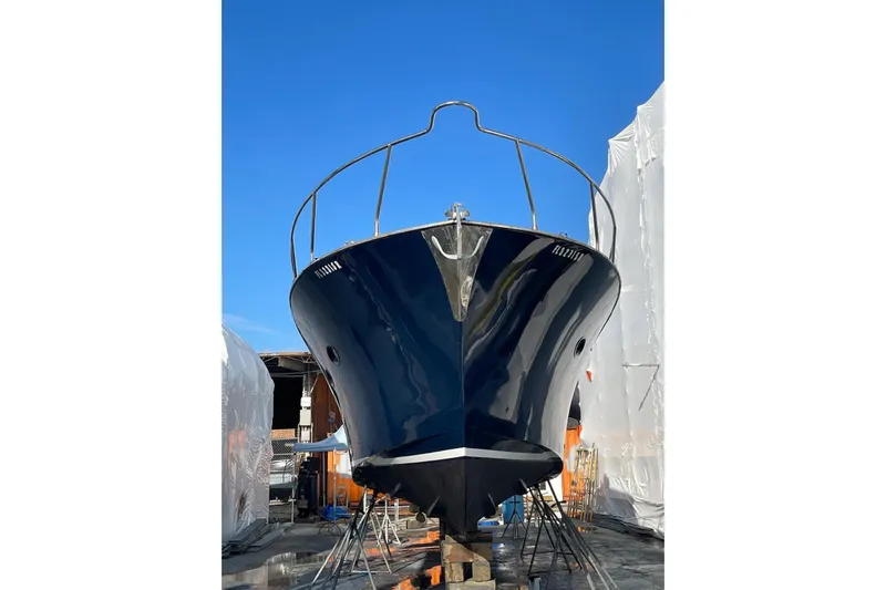  Yacht Photos Pics Custom NNS Sea Scout 41 boat, 2007 model, in dry dock under clear blue sky.