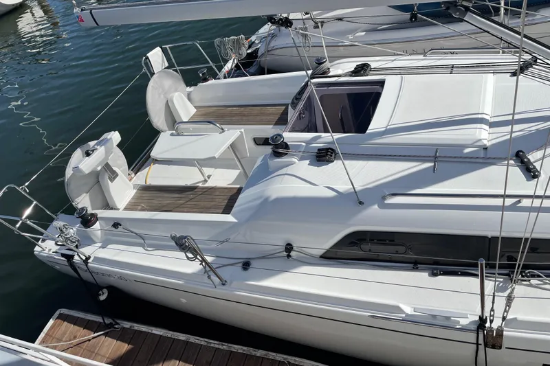 Polaris Yacht Photos Pics 2021 Beneteau Oceanis 30.1 sailboat docked, showcasing sleek deck design and modern features.