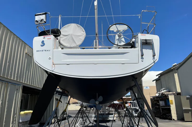 Polaris Yacht Photos Pics Beneteau Oceanis 30.1 sailboat, 2021 model, docked in a marina under clear blue skies.