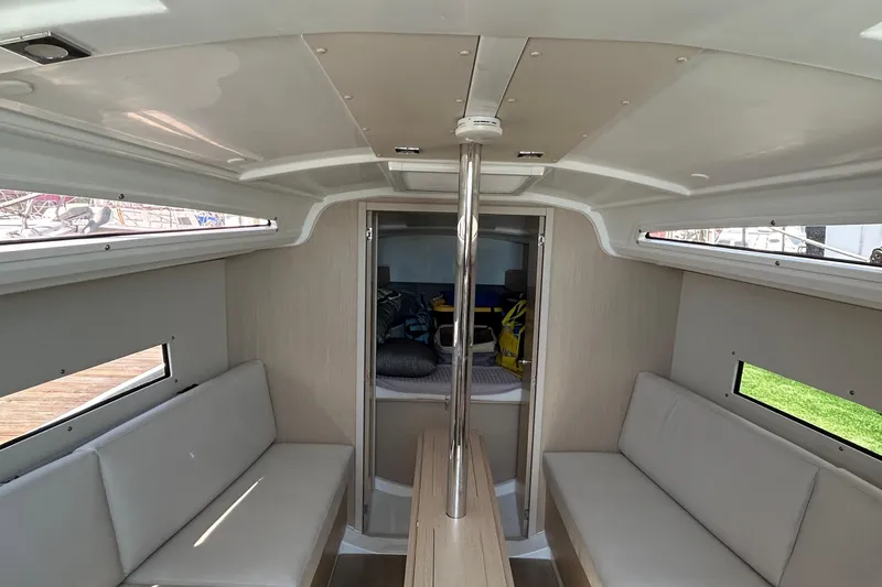 Polaris Yacht Photos Pics Interior of 2021 Beneteau Oceanis 30.1 sailboat, featuring seating and modern design.
