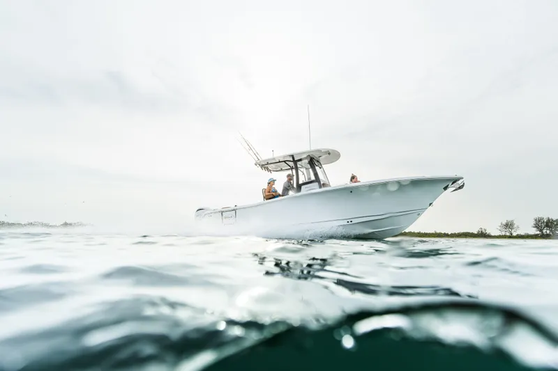  Yacht Photos Pics 2026 Sea Hunt Ultra 265 SE boat cruising on open water.