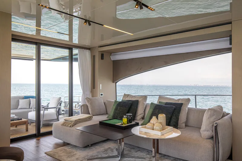  Yacht Photos Pics Luxurious interior of 2026 Cranchi Sessantasette 67 Fly yacht with ocean view.