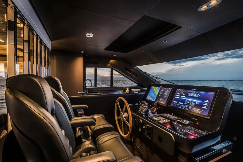  Yacht Photos Pics Luxurious 2026 Cranchi Sessantasette 67 Fly yacht cockpit with advanced navigation systems.