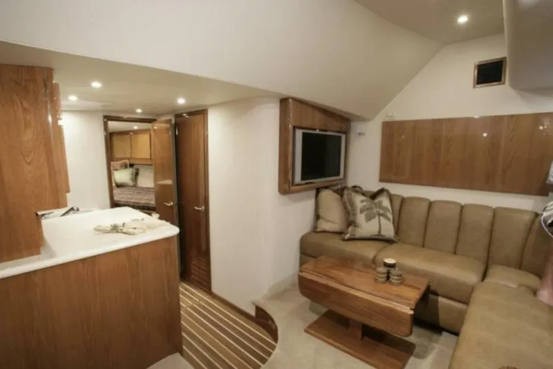  Yacht Photos Pics Luxurious interior of 2027 Buddy Davis 48 Express yacht with cozy seating and modern amenities.