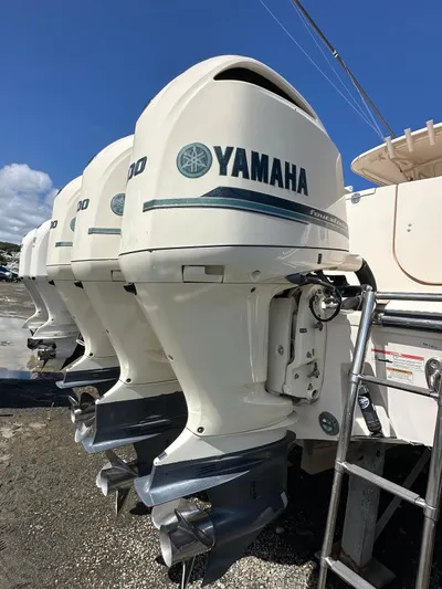  Yacht Photos Pics 2018 Grady-White Canyon 336 with Yamaha outboard engines, docked under clear blue sky.