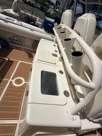  Yacht Photos Pics 2018 Grady-White Canyon 336 boat interior with rod holders and seating.