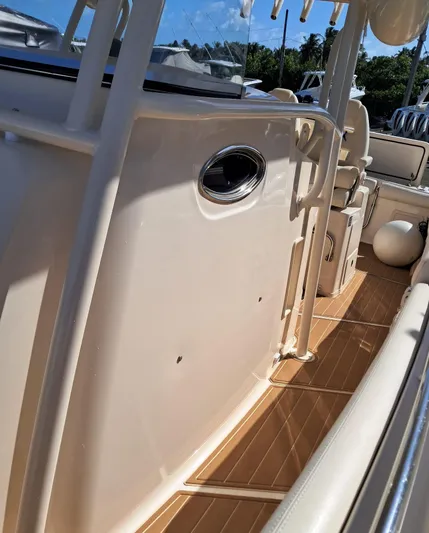  Yacht Photos Pics 2018 Grady-White Canyon 336 boat interior with sleek design and wooden flooring.