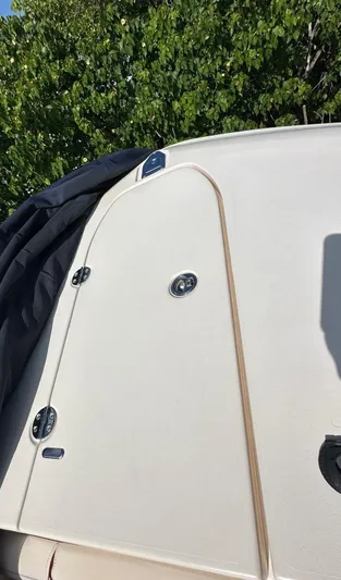  Yacht Photos Pics 2018 Grady-White Canyon 336 boat detail with trees in the background.