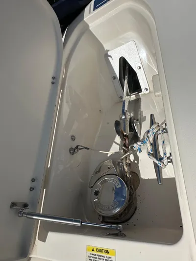  Yacht Photos Pics Anchor compartment of 2018 Grady-White Canyon 336 boat, featuring winch and rope storage.