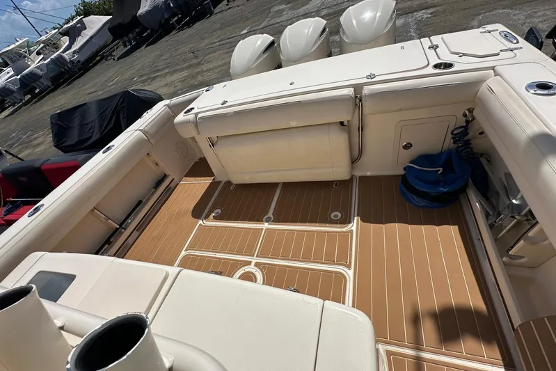  Yacht Photos Pics 2018 Grady-White Canyon 336 boat deck with clean, spacious layout and storage compartments.
