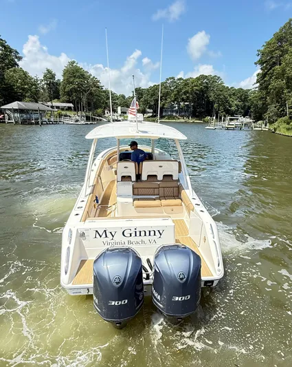 My Ginny Yacht Photos Pics 2014 Pursuit ST 310 Sport boat on water, Virginia Beach, with twin Yamaha engines.
