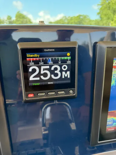 My Ginny Yacht Photos Pics Garmin display on 2014 Pursuit ST 310 Sport showing 253° heading in standby mode.