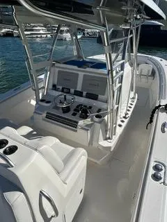 Yacht Photos Pics 2017 Invincible 39 Open Fisherman boat interior with helm and seating.