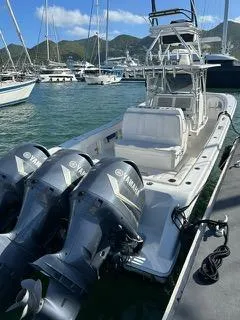  Yacht Photos Pics 2017 Invincible 39 Open Fisherman boat with Yamaha engines docked in a marina.