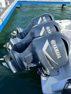  Yacht Photos Pics 2017 Invincible 39 Open Fisherman with triple Yamaha outboard engines at dock.
