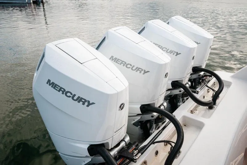  Yacht Photos Pics Four Mercury outboard engines on a 2021 Valhalla Boatworks V-46, docked on water.